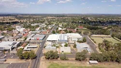 Aerial View of a Small Town With Lots of Buildings and Trees — Grants Express in Forbes, NSW