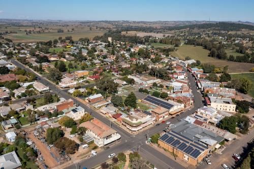 Aerial View of a Small Town With Lots of Buildings and Trees — Grants Express in Ingleburn, NSW