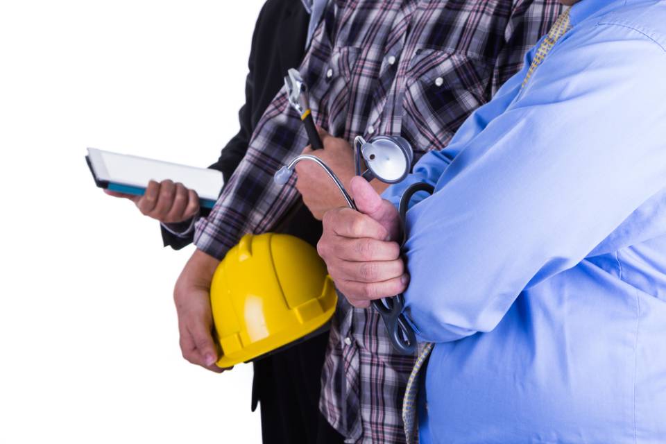 construction contractor holding their tools