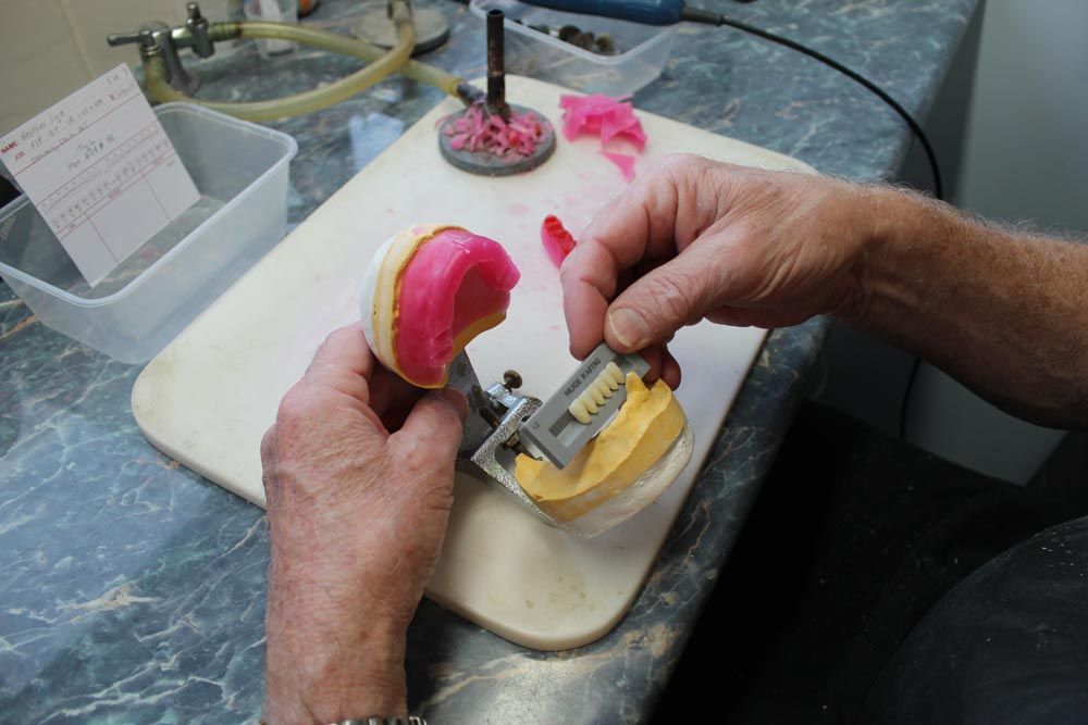 Man Crafting A Dentures