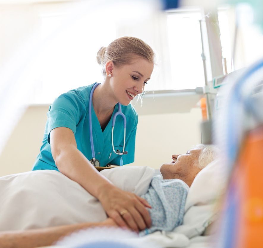 A nurse is talking to a patient in respite care