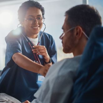 Doctor Using Stethoscope 