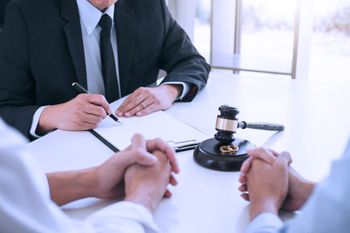 Lawyer Signing Decree of Divorce — Jacksonville, FL — The Divorce Mediation Center