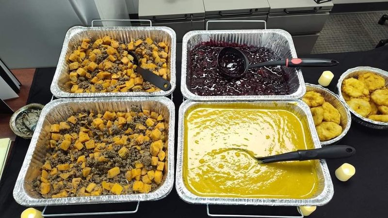 Trays of squash, berry sauce, soup and frybread