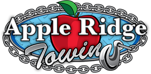 a logo for apple ridge towing with an apple on it