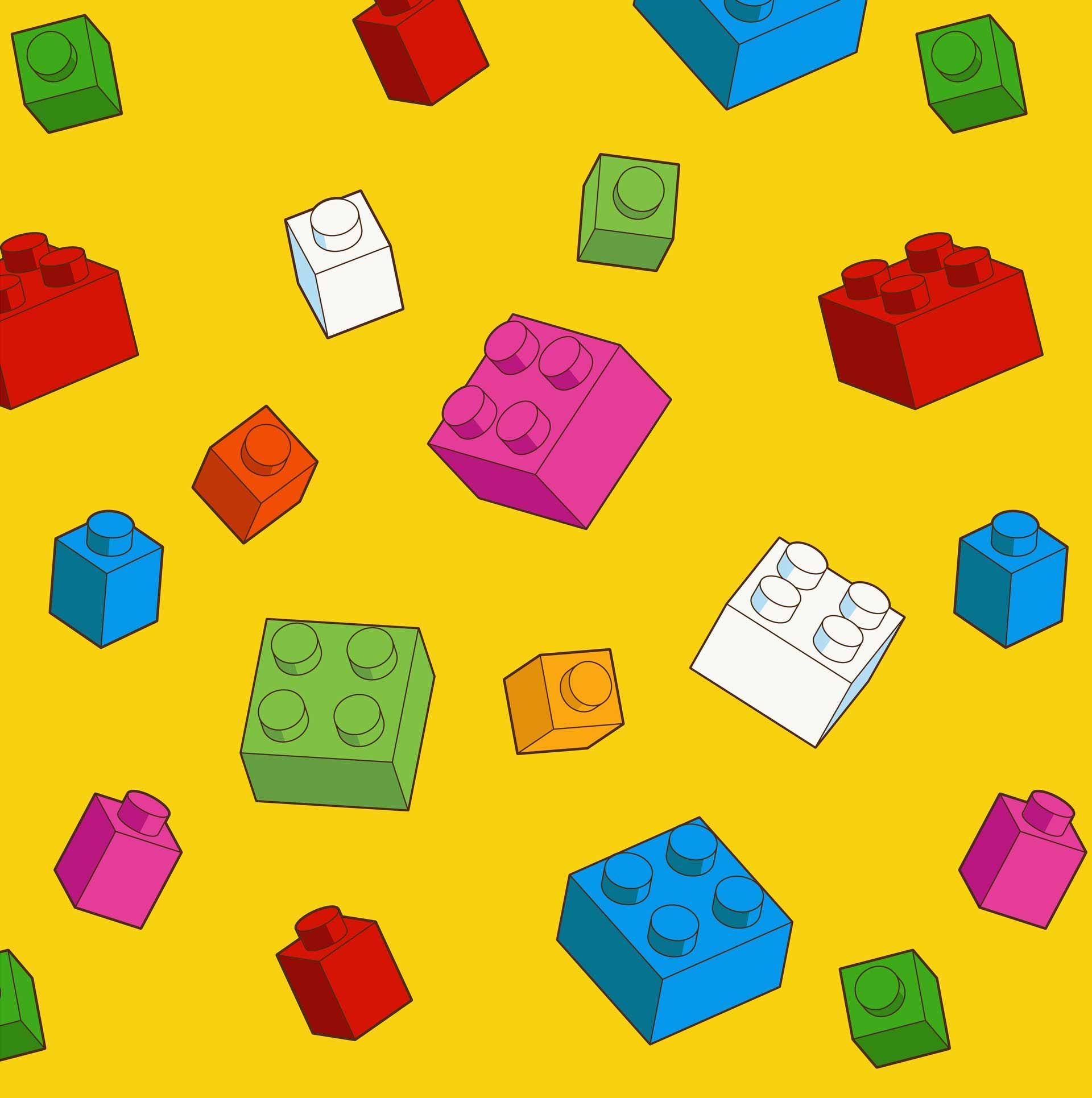 Colorful Lego bricks scattered on a yellow background.