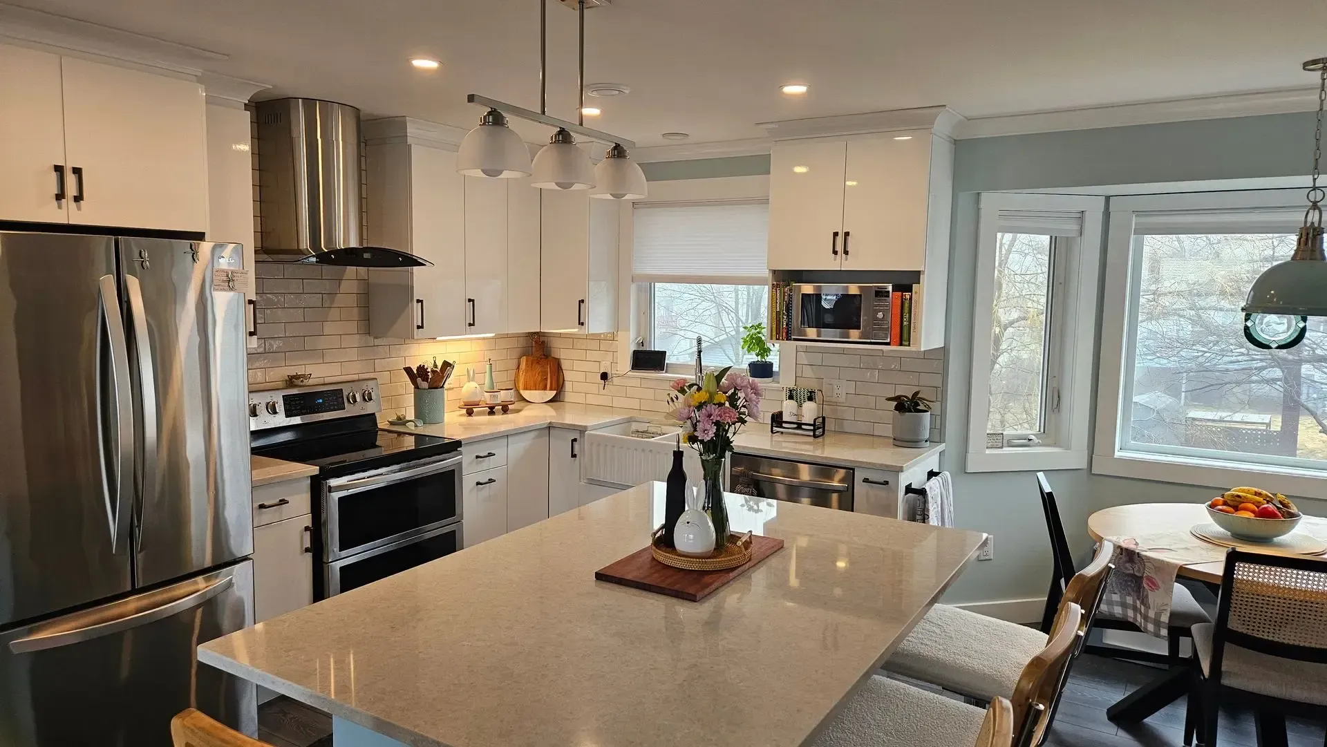 The completed kitchen remodeling project showcases a fully open-concept design serving a  Dartmouth homeowner