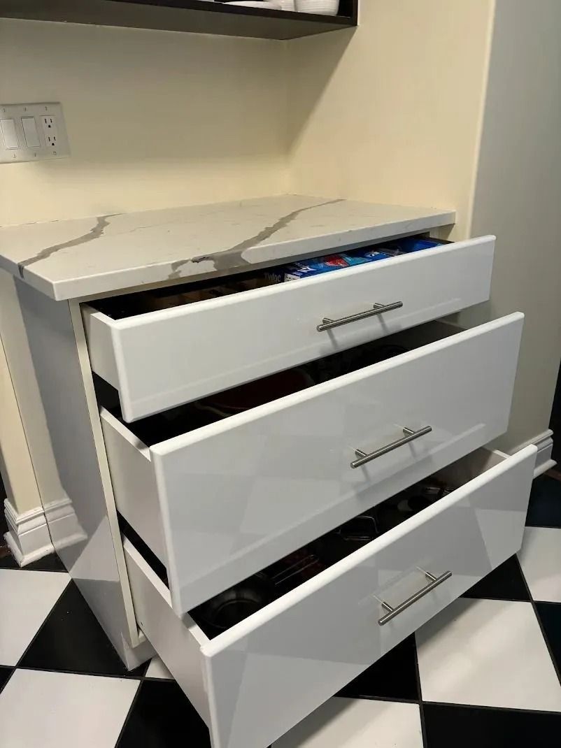  White cabinet painting project in Halifax with upgraded drawer system and quartz countertop