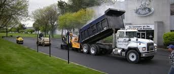 Multiple trucks and rollers — South Concord, NC — Smith Brothers Asphalt Paving