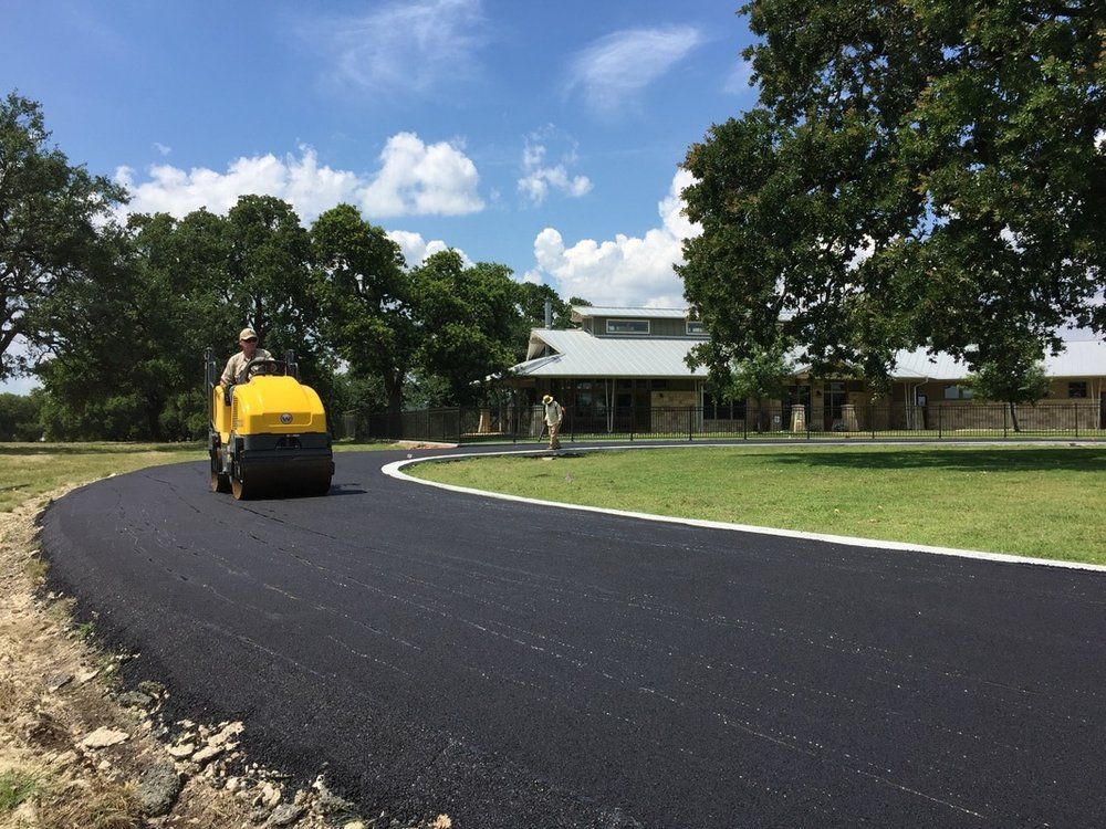 Single roller on asphalt road — South Concord, NC — Smith Brothers Asphalt Paving