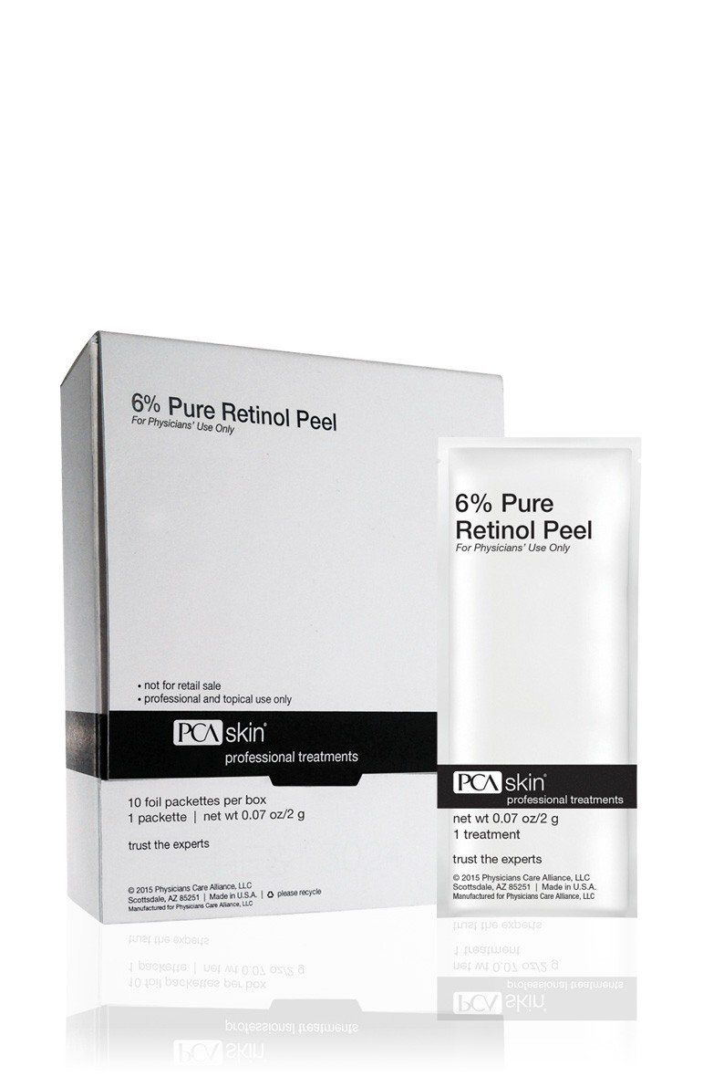 A box of 6 % pure retinol peel is sitting next to a bottle of it.