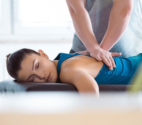 Woman Getting Chiropractic Treatment — Malvern, PA — Whitelands Chiropractic Health Center
