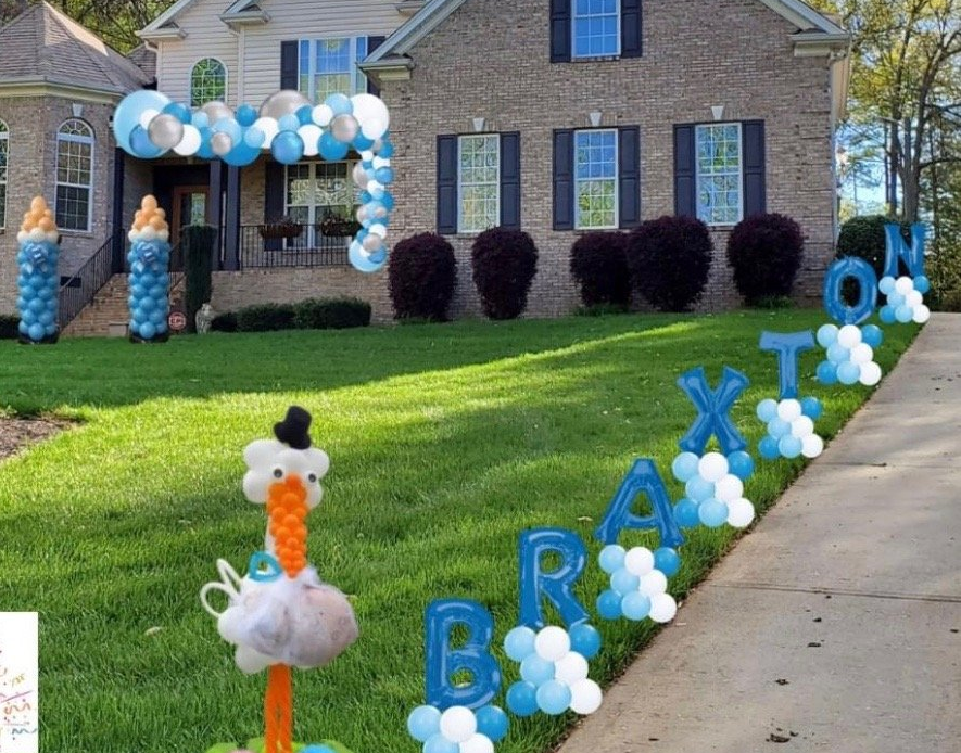 A custom balloon design made for a drive up Baby Shower.