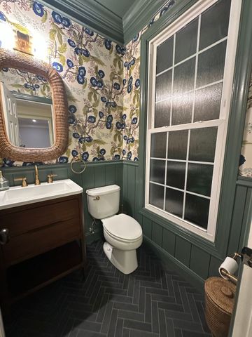 Bathroom renovation: before and after comparison. Old, dilapidated bathroom transforms into a modern space with new fixtures and flooring.