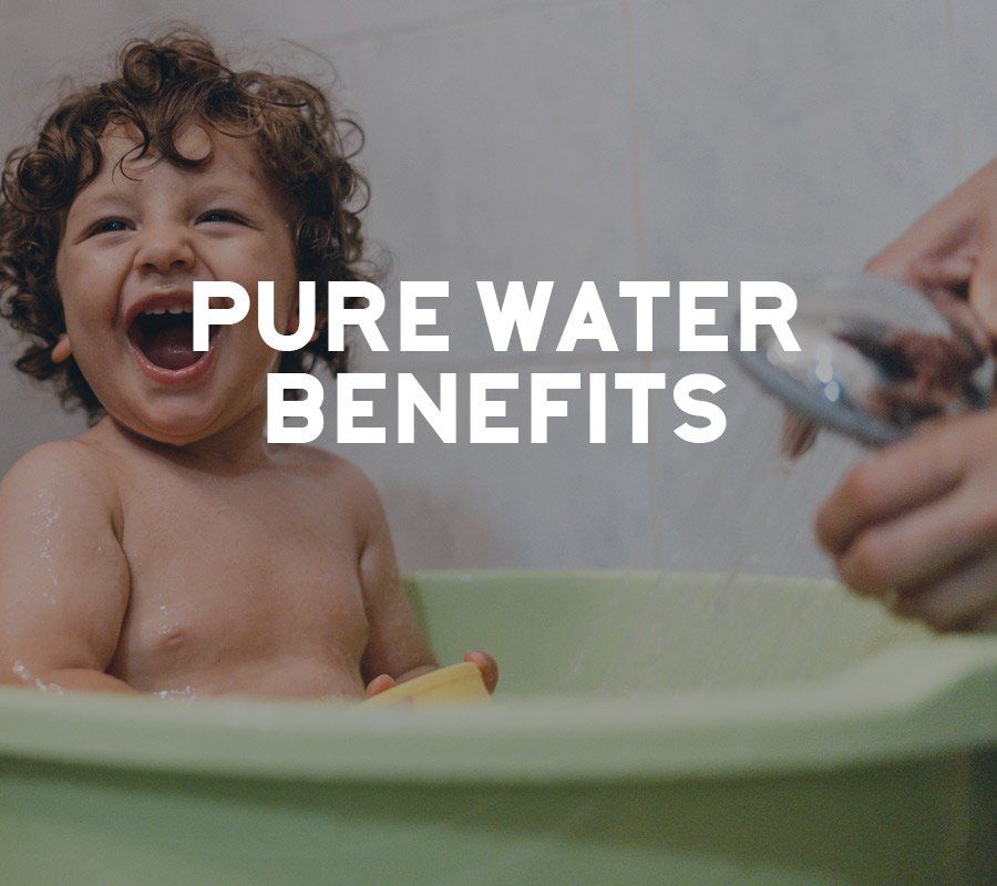 A happy toddler in a bathtub. Text overlay: 