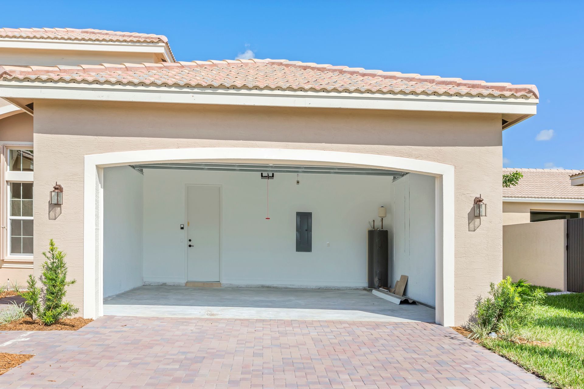 A house with a garage with the door open
