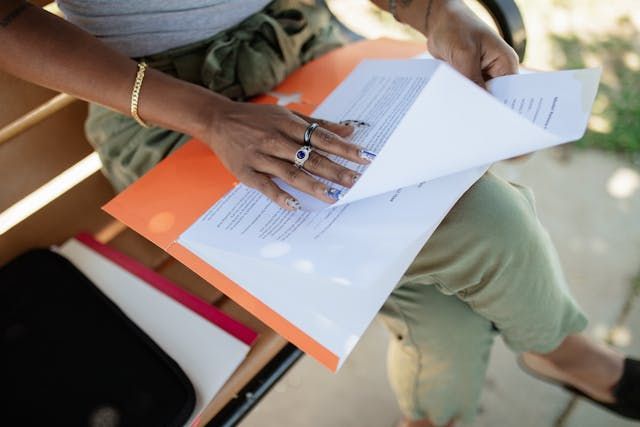 A+person+going+through+documents