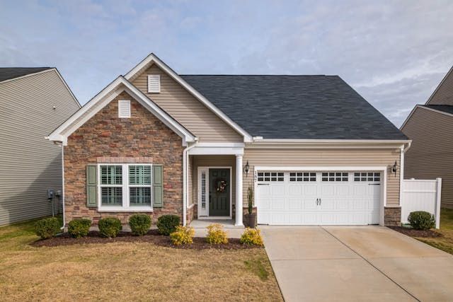 Brick+house+with+two+door+garage
