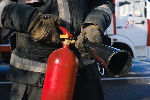 firefighter-using-a-fire-extinguisher