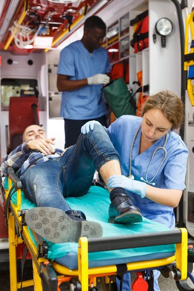 Paramedic Team Providing First Aid — Jonesboro, GA — Caring Hearts EMS