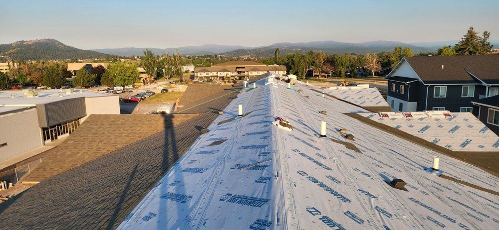 An Aerial View of A Roof with A Lot of Shingles on It | Victor, MT | Double L Roofing