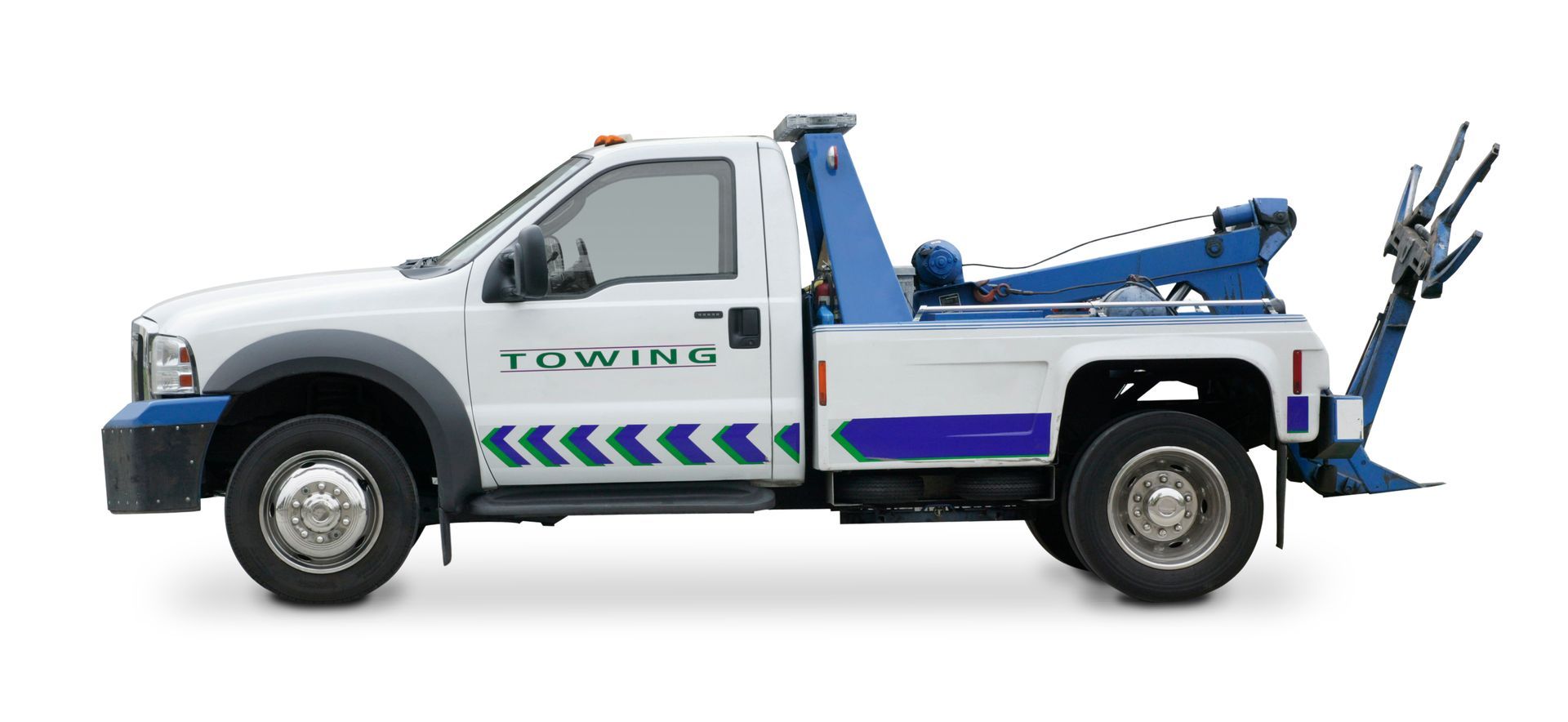 A red semi truck with a white trailer is driving down a highway.