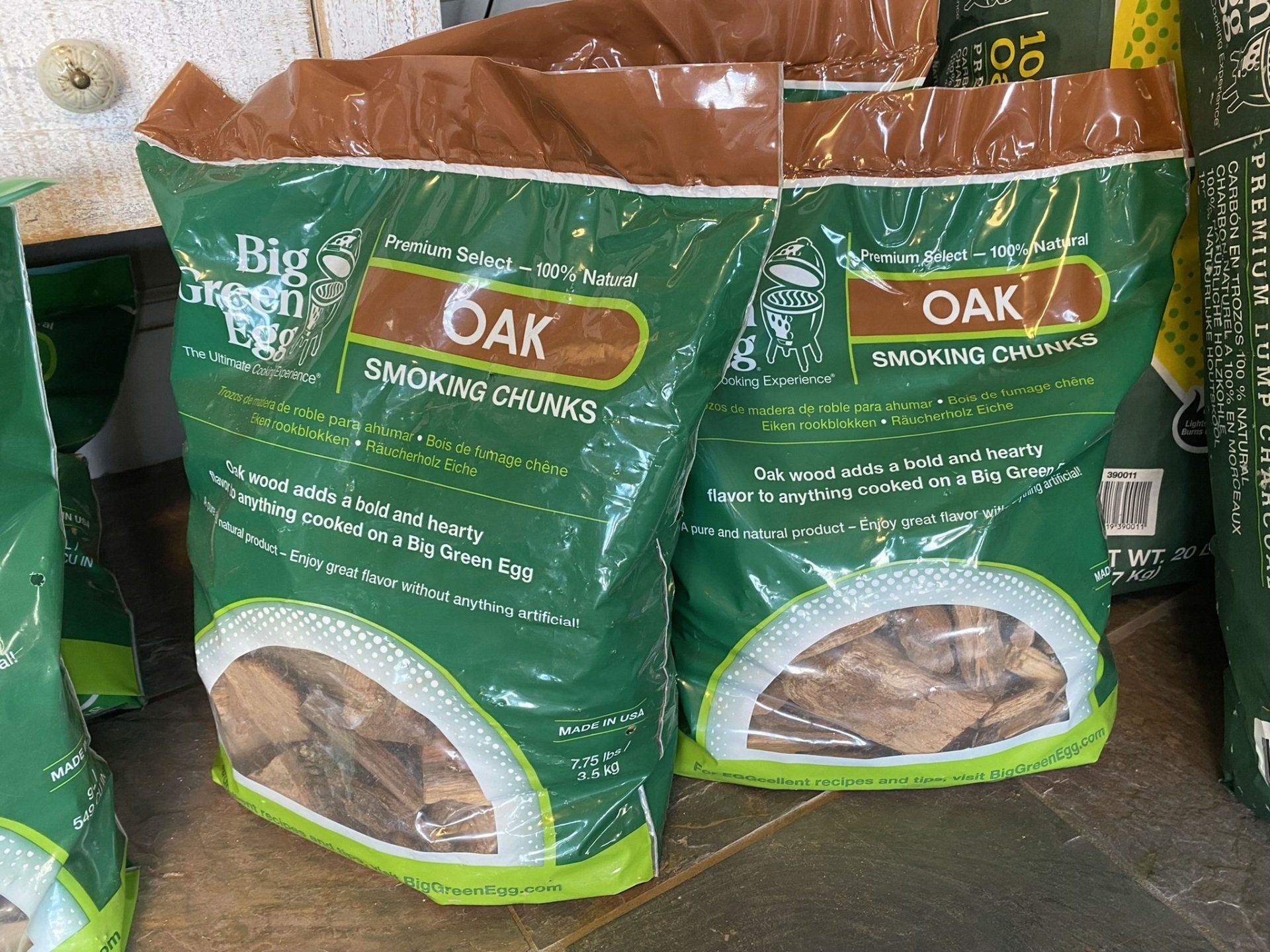Two bags of oak chips are sitting next to each other