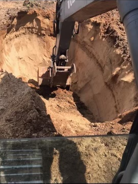 Yellow Backhoe — Cambridge, WI — Dusty Howe Excavating