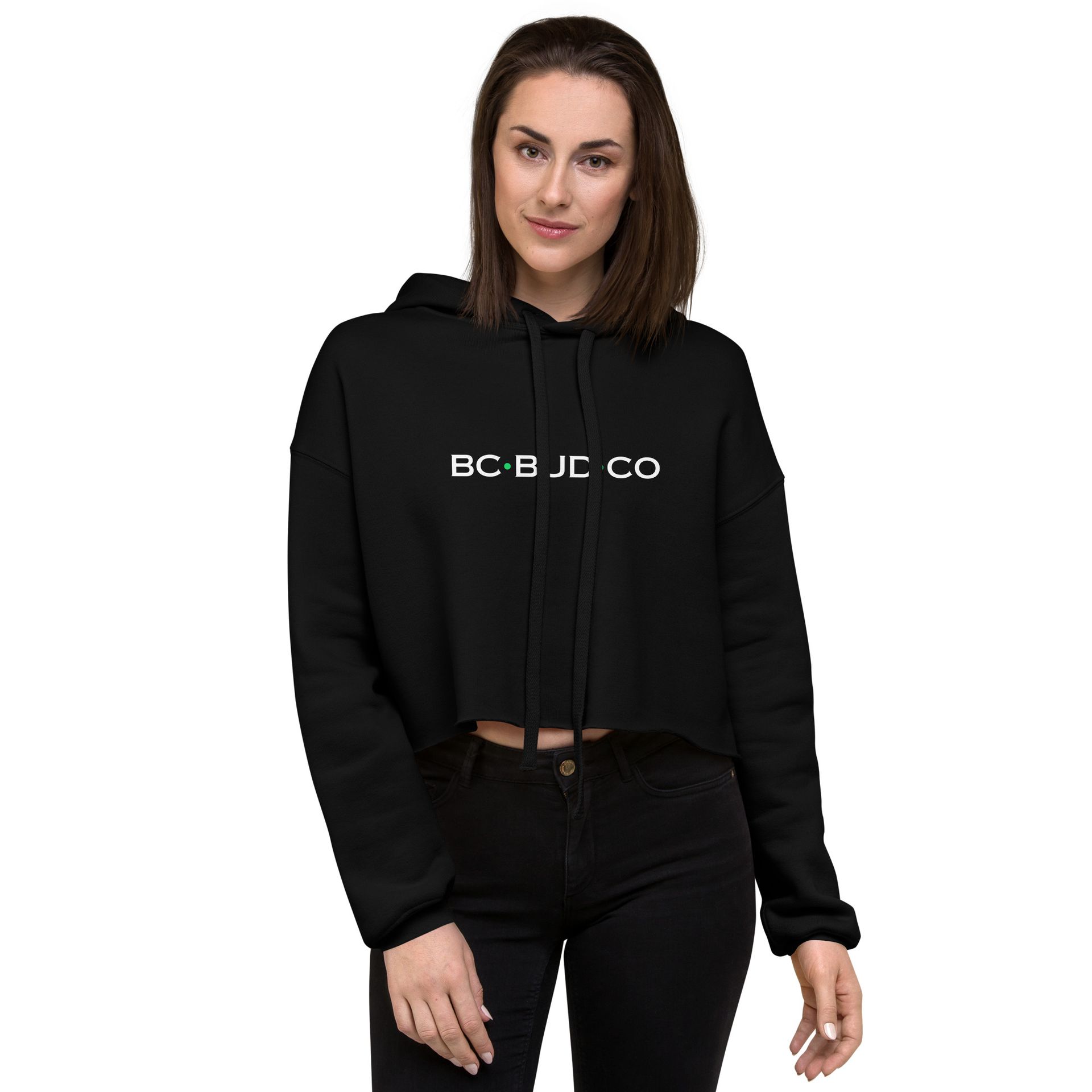 A woman is wearing a black crop top hoodie.