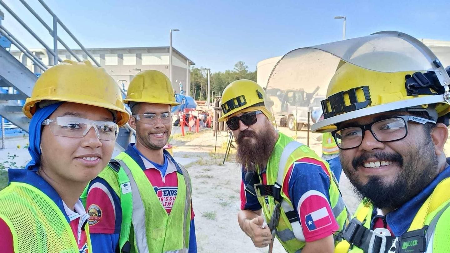 Pressure washing siding of house