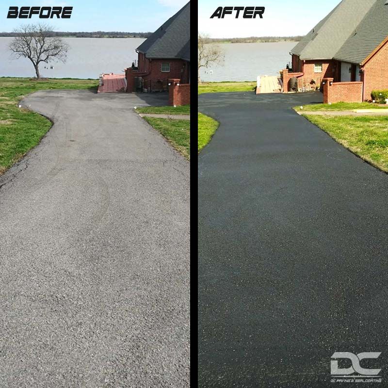 Before-and-after view of a driveway. Left side: gray asphalt. Right side: freshly sealed, black asphalt. Houses and a lake in the background.