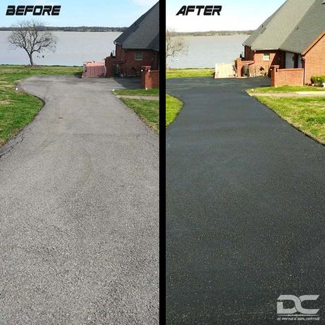 Before-and-after view of a driveway. Left side: gray asphalt. Right side: freshly sealed, black asphalt. Houses and a lake in the background.