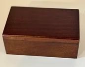 Wooden rectangular box with a dark brown finish.