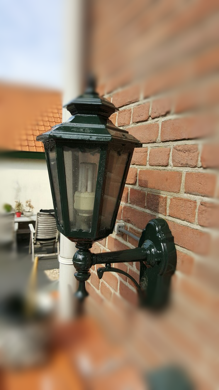 Groene lantaarn opgeknapt.
