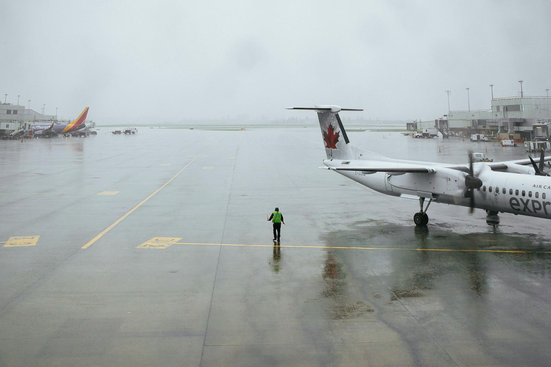 Image of airplane runway with airplane.