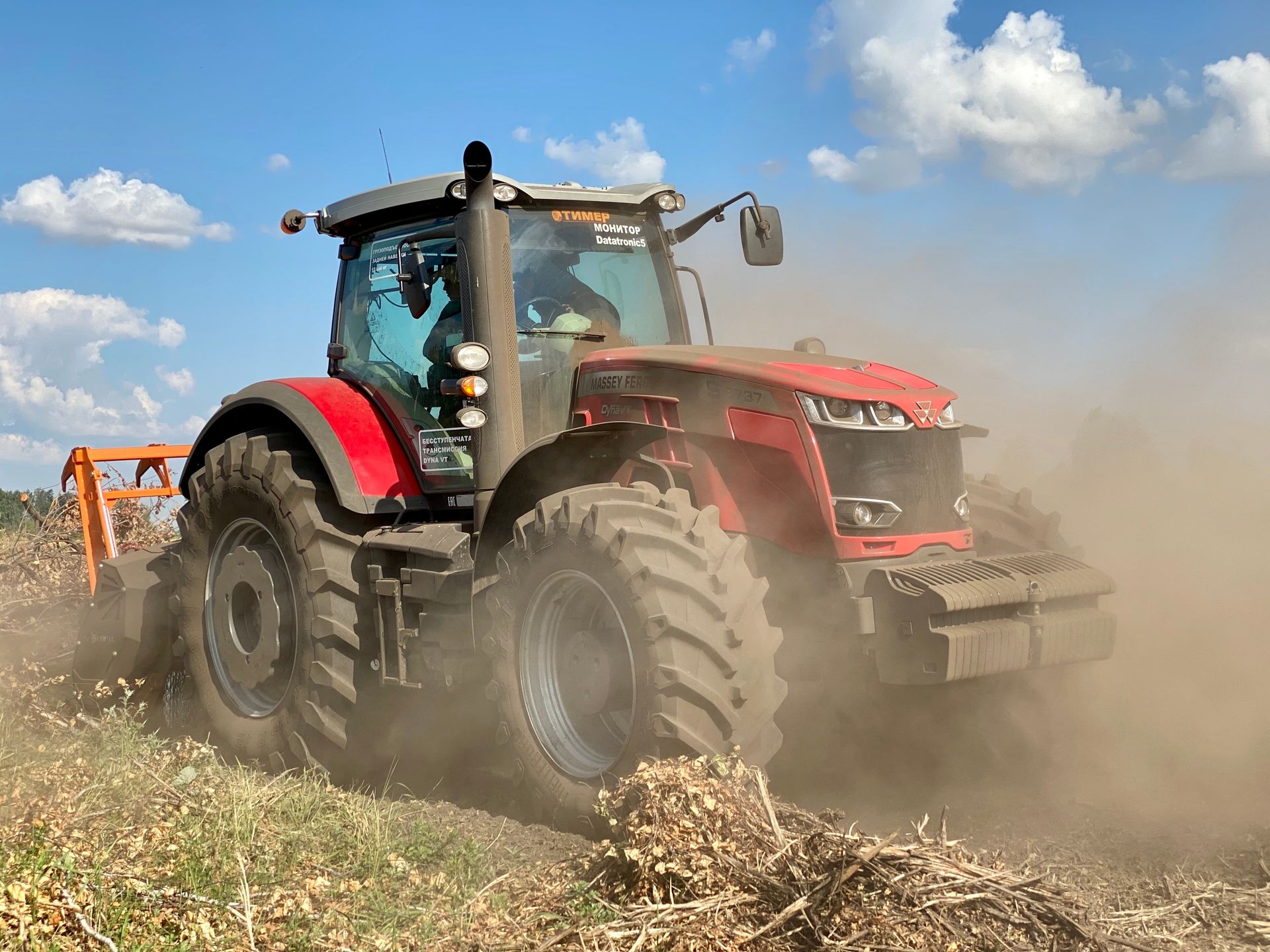 Red Massey Ferguson tractor on a grassy path