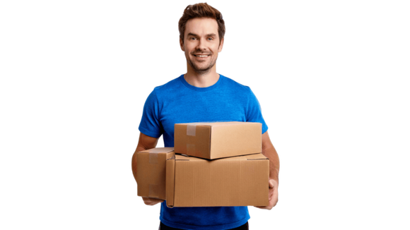 Man in blue shirt smiling, holding two cardboard packages.