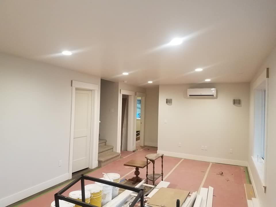 A living room in a house that is being remodeled.