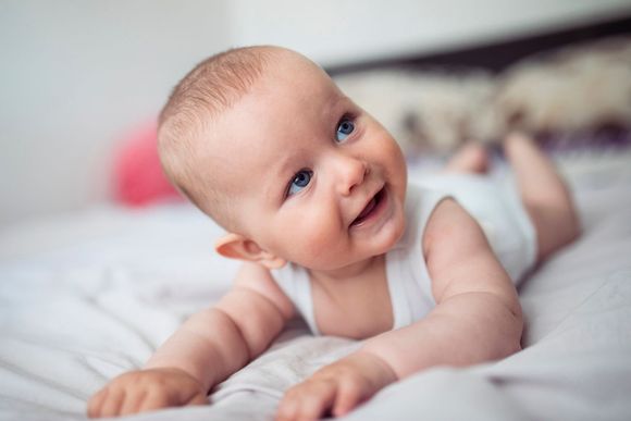 Smiling Baby on Blanket