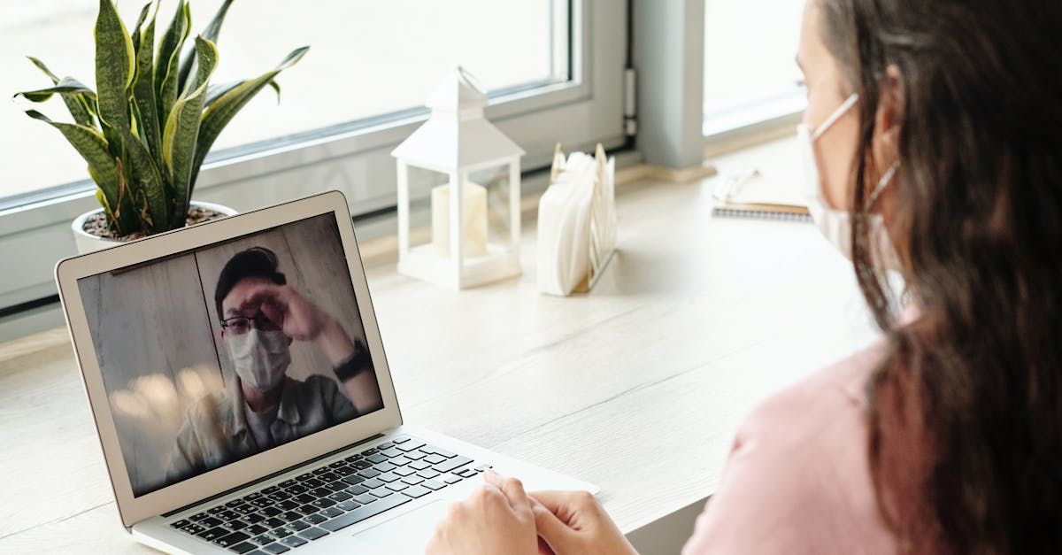 Women on a telehealth call via her laptop