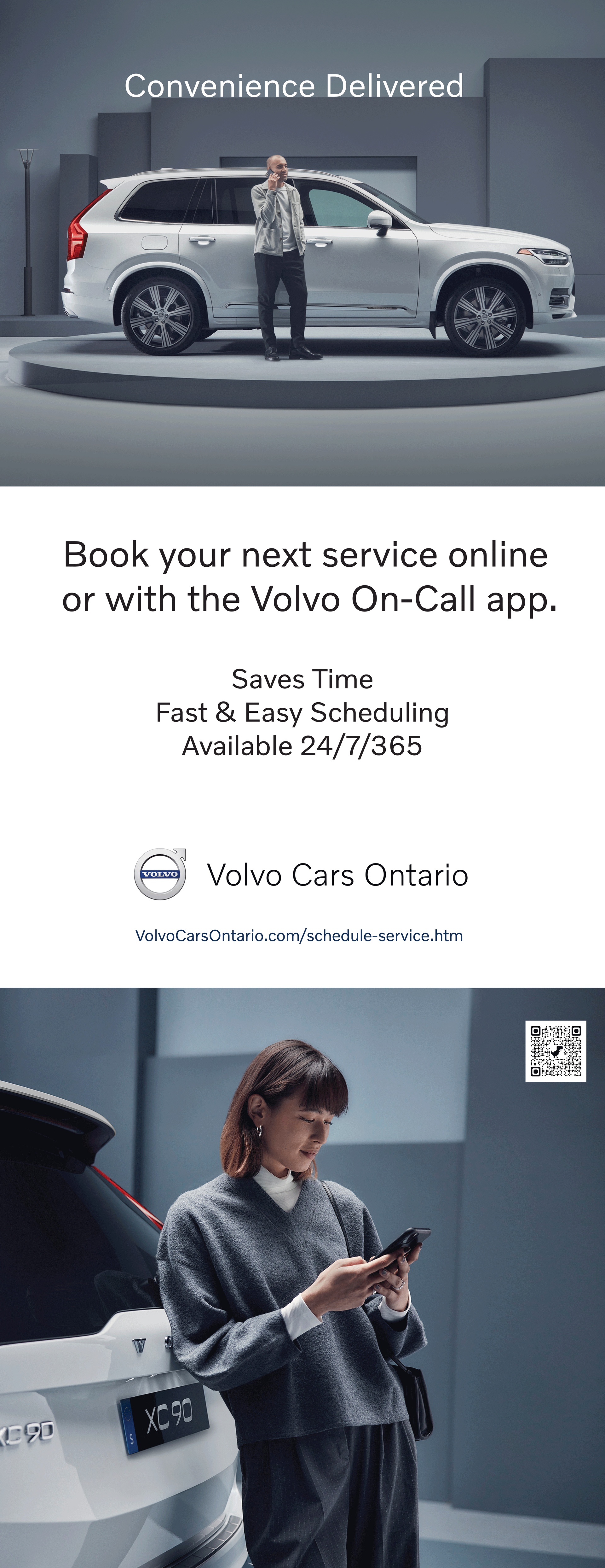 A woman is standing next to a car and looking at her phone.