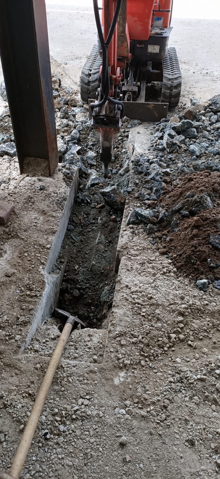 Sleuf hakken minigraver