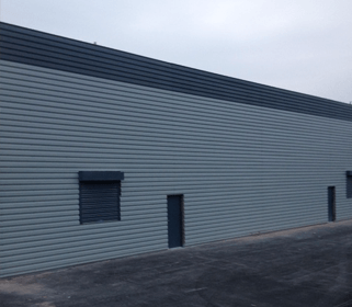factory building with metal cladding