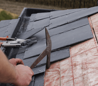 roofers installing roof tiling