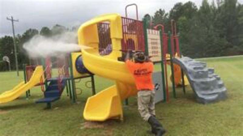 man washing playground