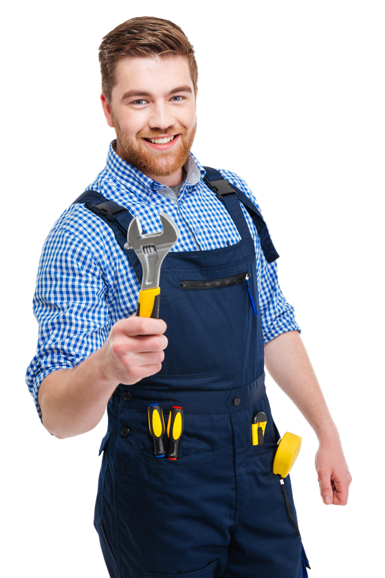 A man in overalls is holding a wrench in his hand.