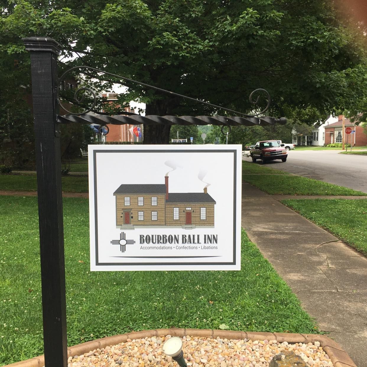 A sign that says bourbon ball inn on it