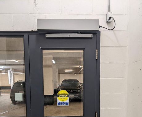 a door with an automatic operator