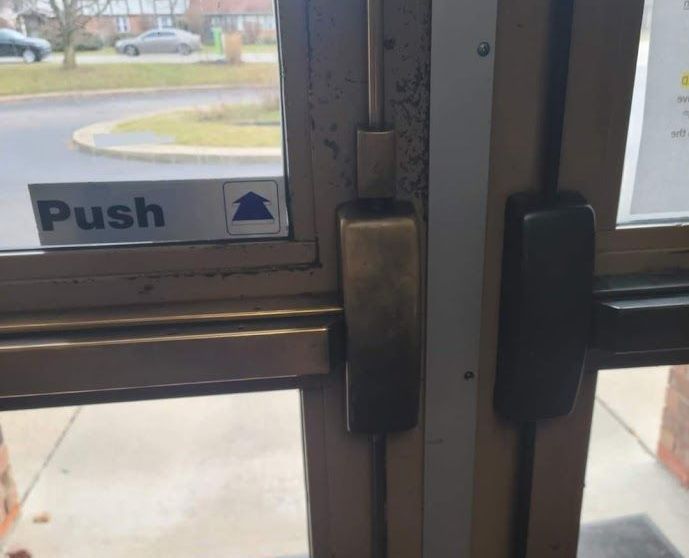 A door with a push sign on it