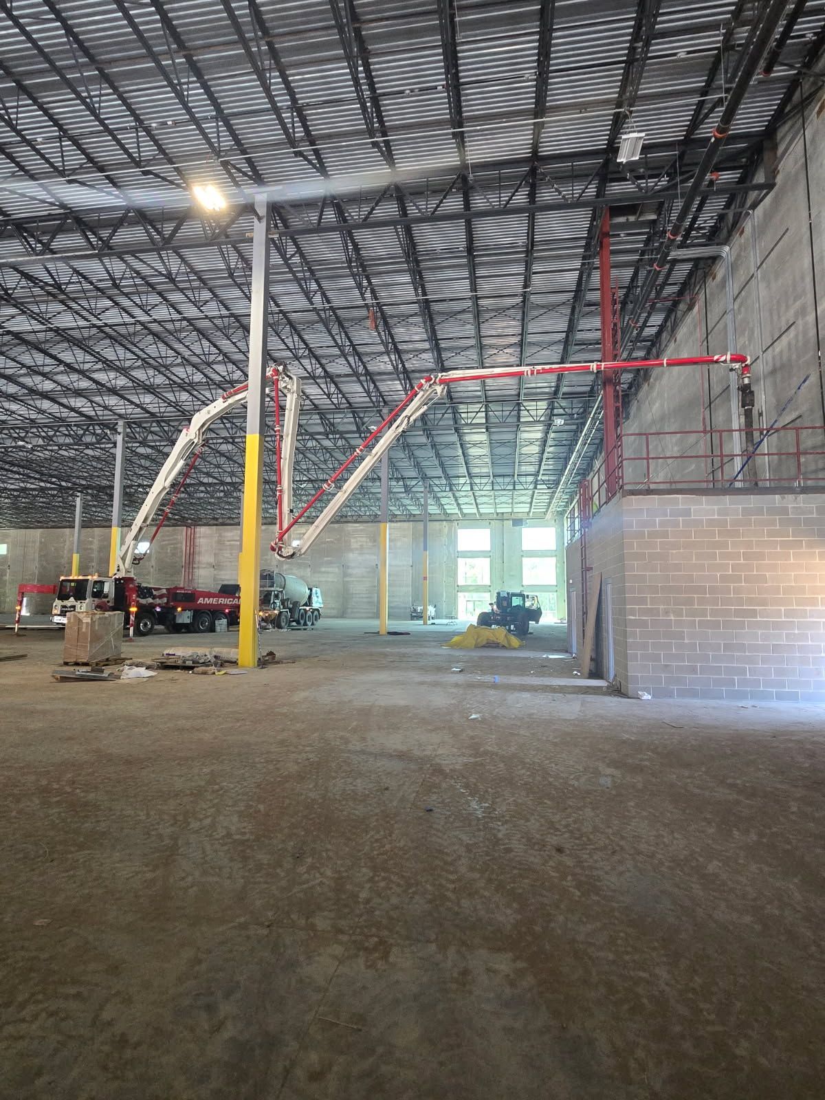 A Concrete Pump Is Being Used to Pour Concrete on A Bridge - Middletown, CT - American Concrete Pumping